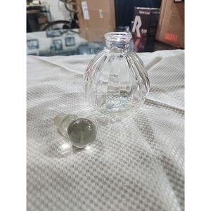 This little Blown glass decanter shaped bottle is a perfume refill bottle. It is
